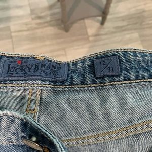 lucky Brand never worn distressed jeans.